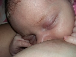 close up of nursing baby