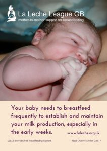 Newborn baby at the breast, with caption 