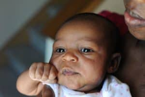 Newborn looking at the camera